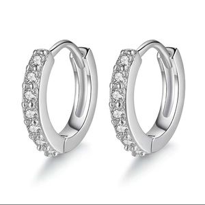 Sterling silver, nickel free, white gold plated hoop earrings. 3mm